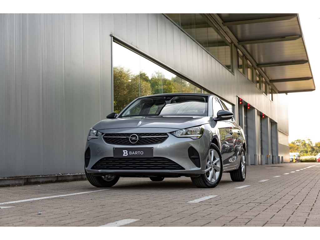 Tweedehands te koop: Opel Corsa Grijs - 12 Benz 75pkNaviAlu VelgParkeersens